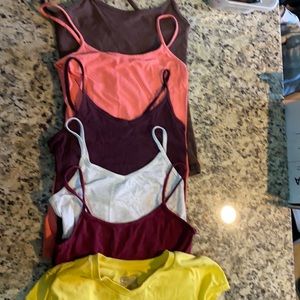 5 cami or tank tops and a T-shirt